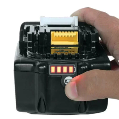 Detail view of black and yellow battery pack with LED indicators.